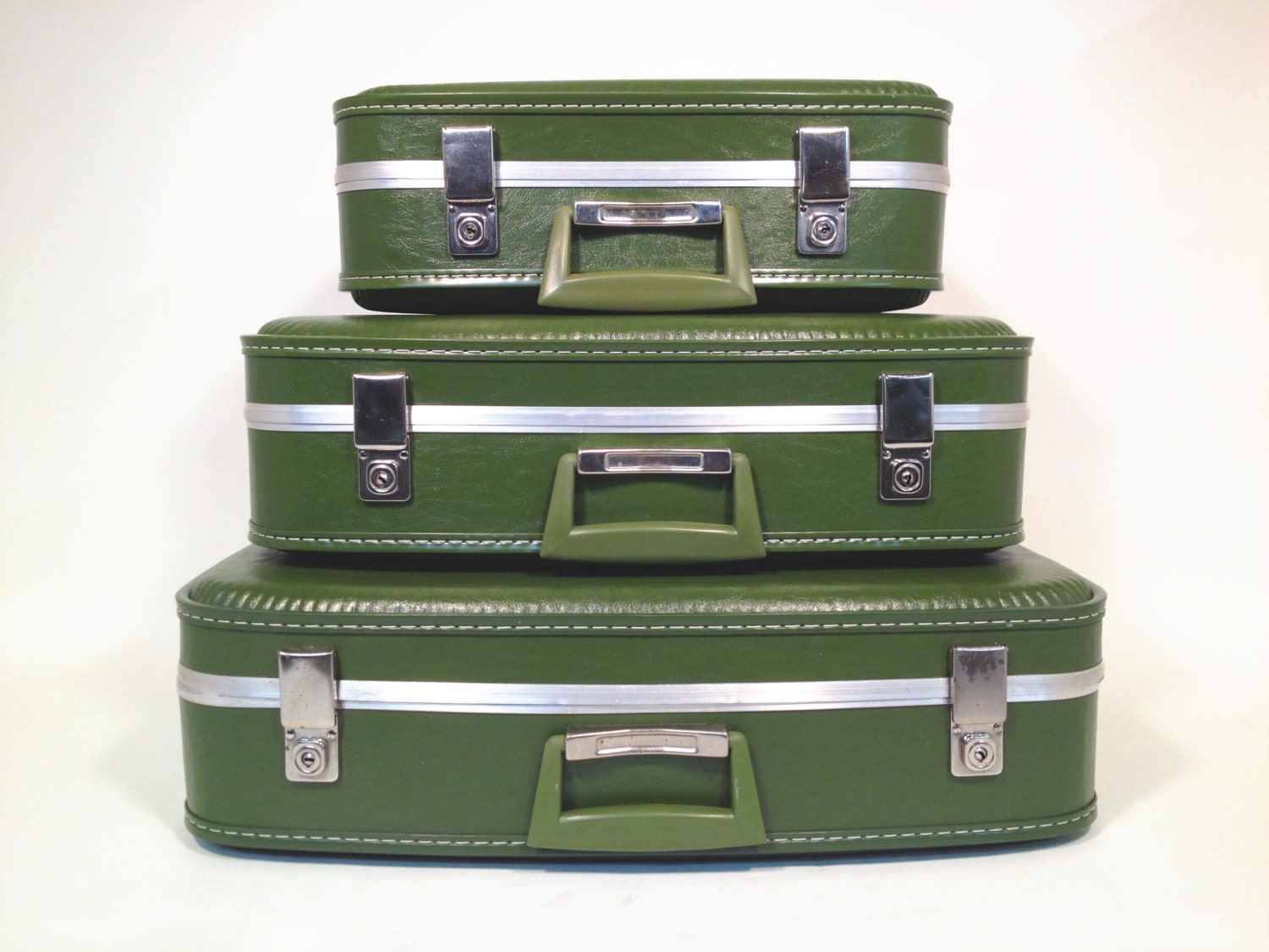 green suit cases