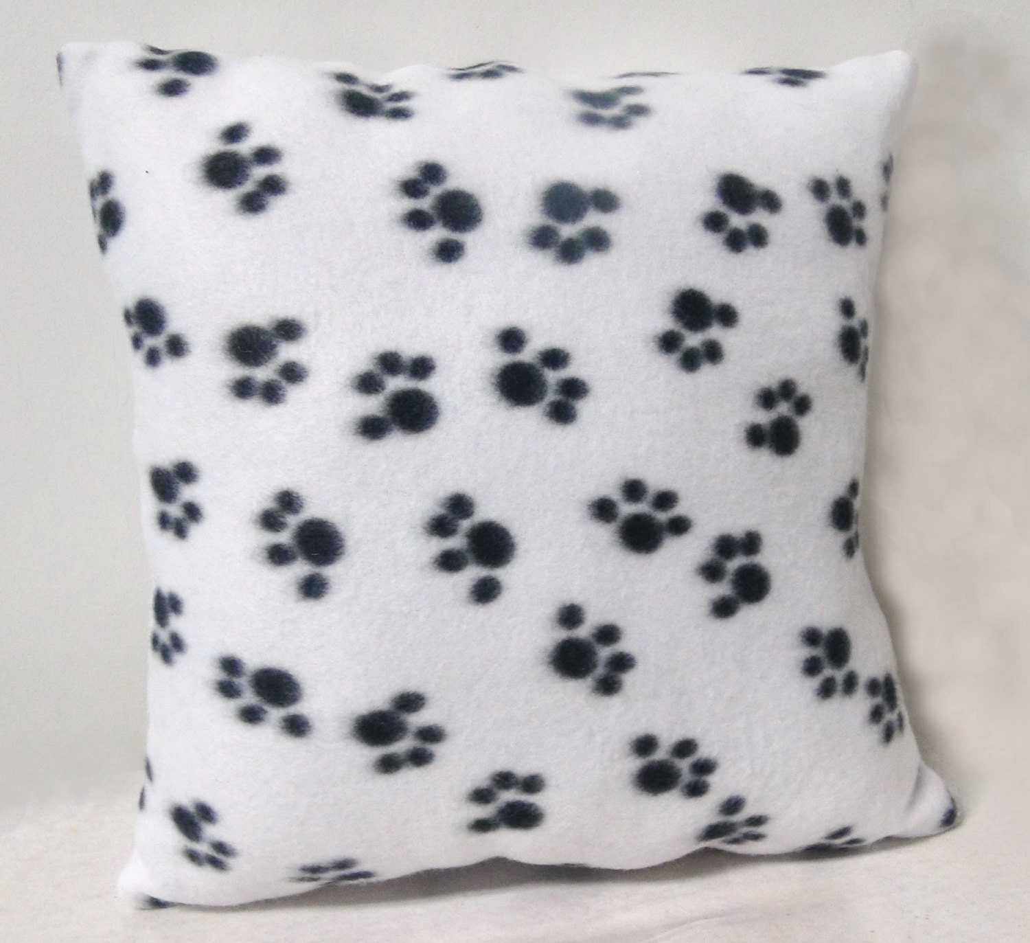 paw print pillow