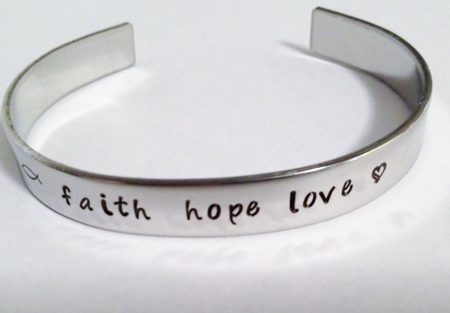 Personalized stainless steel cuff bracelet. Hand stamped with
