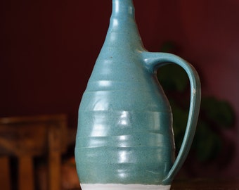 Blue olive oil jug