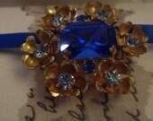 Recrafted Ribbon brooch necklace,goldtone,bluestone