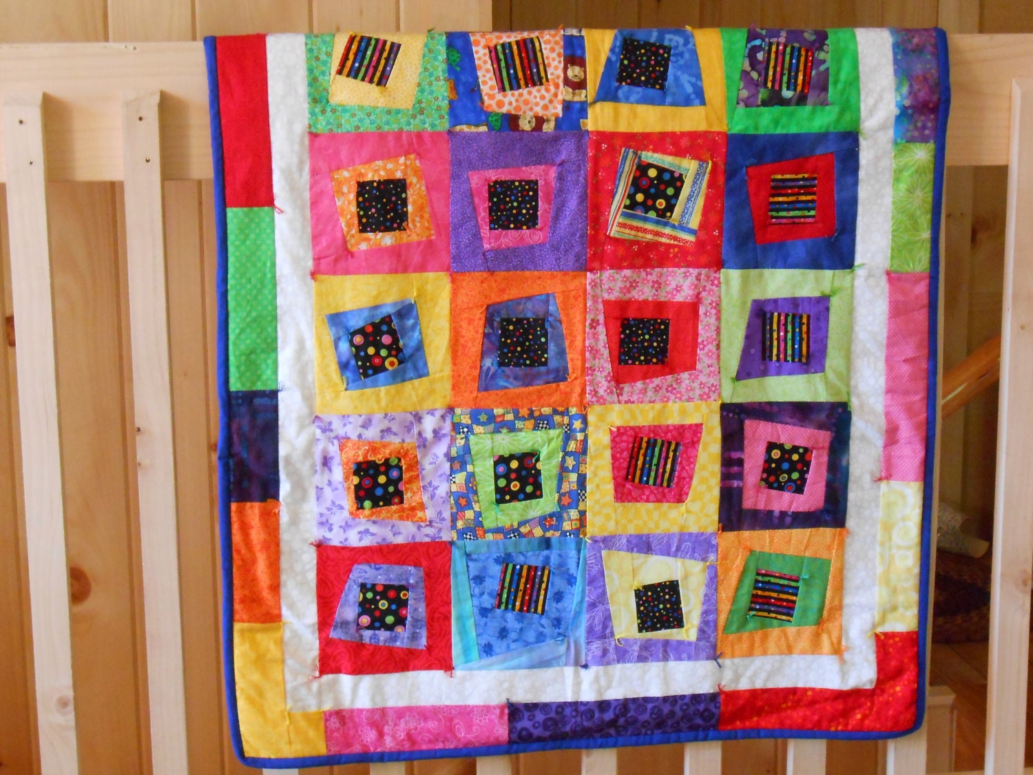 bright-crazy-log-cabin-baby-quilt