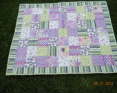 Gorgeous Hand Made Baby Girl Quilt with butterflies, dragonflies, snails and lady bugs. Green, yellow, purple, blue, and white colors.