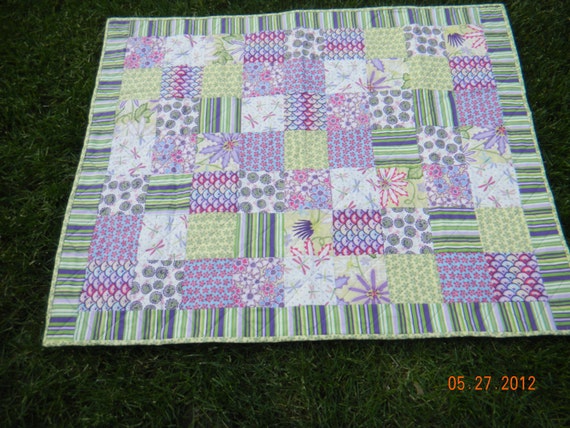 Gorgeous Hand Made Baby Girl Quilt with butterflies, dragonflies, snails and lady bugs. Green, yellow, purple, blue, and white colors.