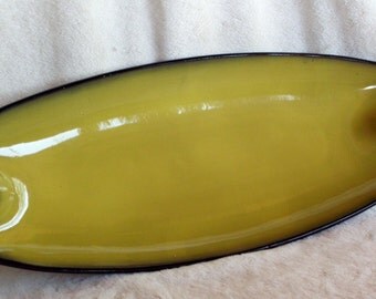Long, unusually-shaped shallow deep mustard-y chartreuse vintage dish