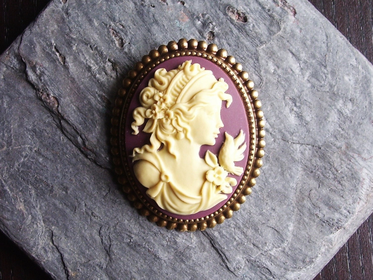 purple cameo brooch