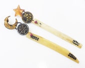 Sabaism. Cosmic rustic victorian tribal assemblage earrings with  bone game pieces, shaft buttons, gold leafed star moon.