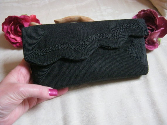 little black clutch