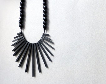geometric tribal statement necklace with black sticks and beads , contemporary jewelry