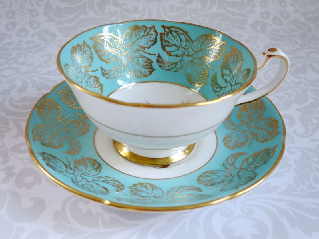 Vintage Teacup and Saucer Set in Turquoise by SwirlingOrange11