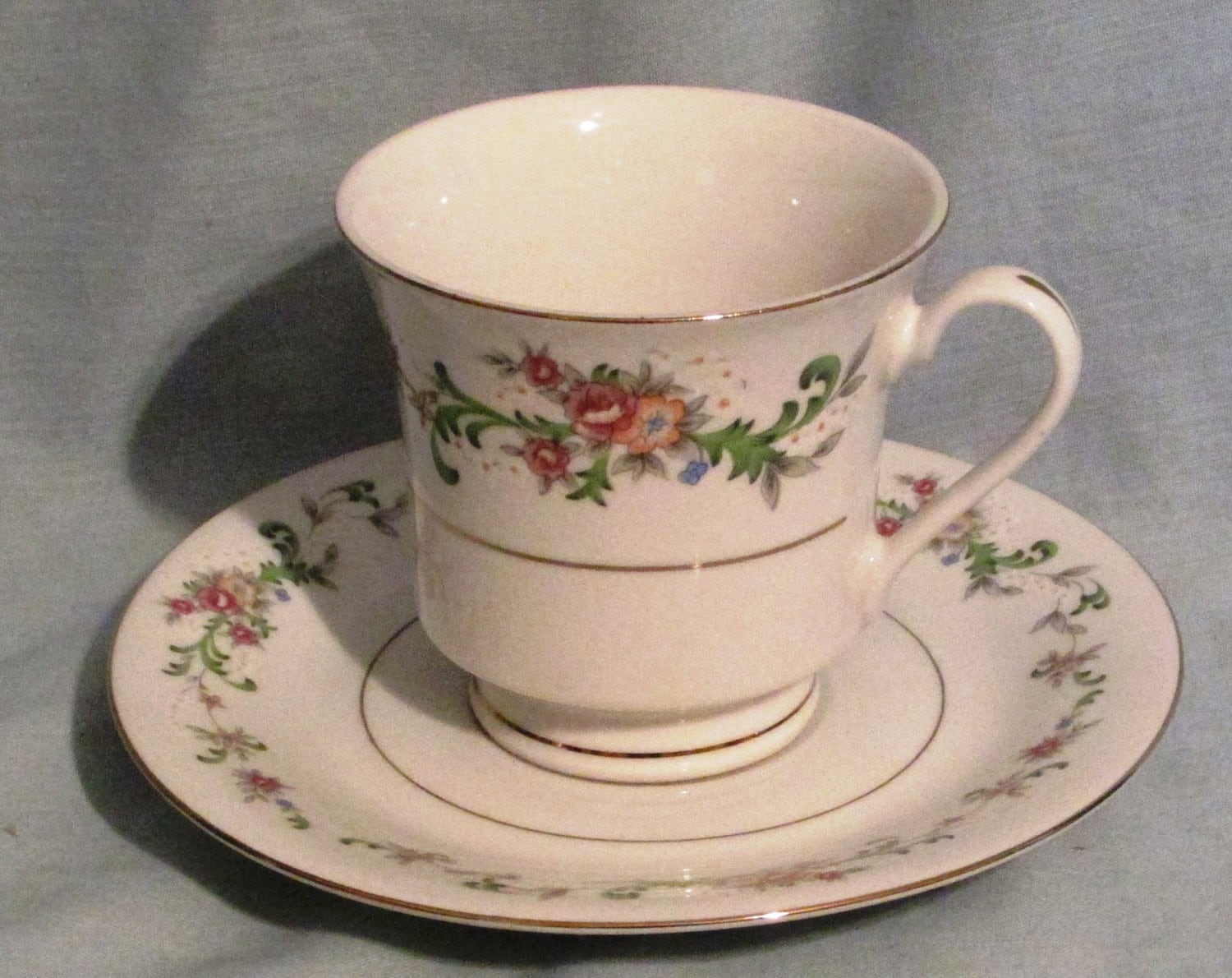 Tea Cup and Saucer White with Gold Trim Floral by peachiepockets