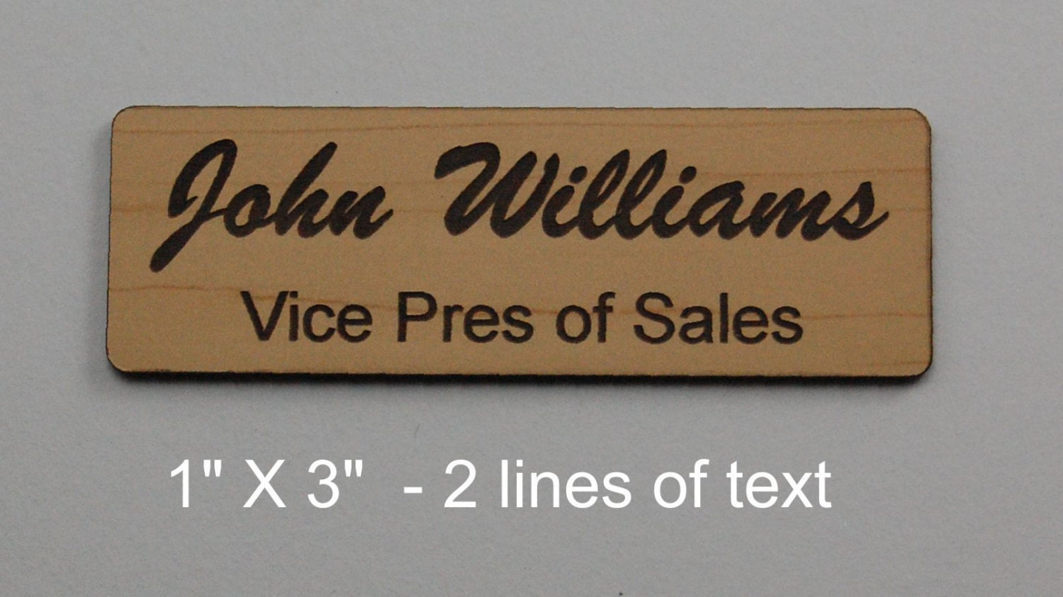 Laser engraved personalized 1 X 3 name tags cut