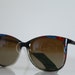 Vintage Polaroid Blue, Deep Red, Crystal Black Frame, Polarizing Lenses. POLAROID CLASSIC 8750B. Made in Italy