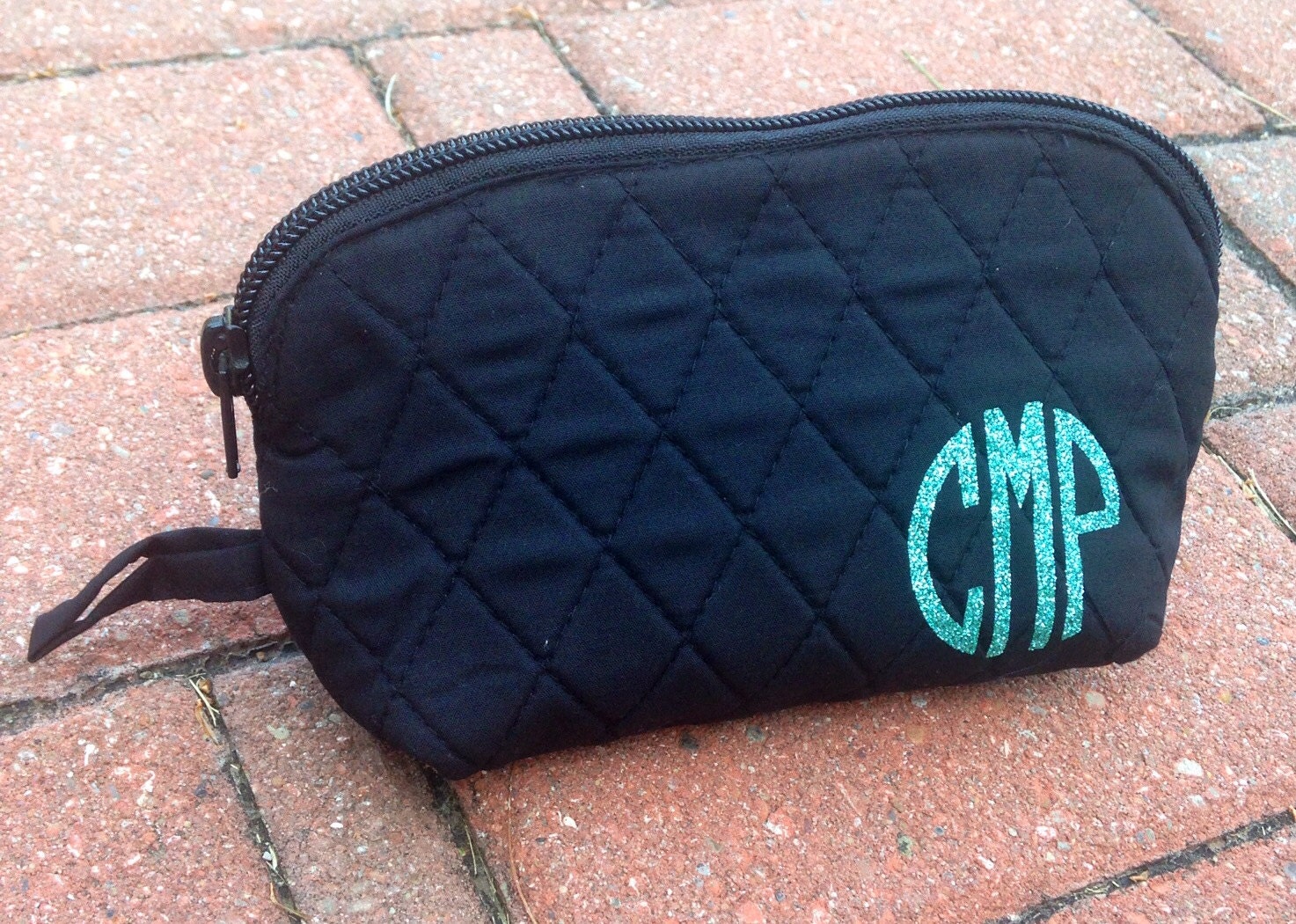 black quilted makeup bag