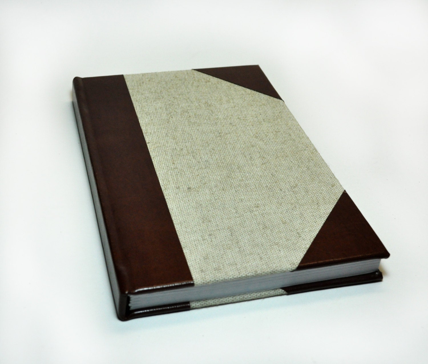 Quarter Bound Book with Bonded Leather Spine and Corners and