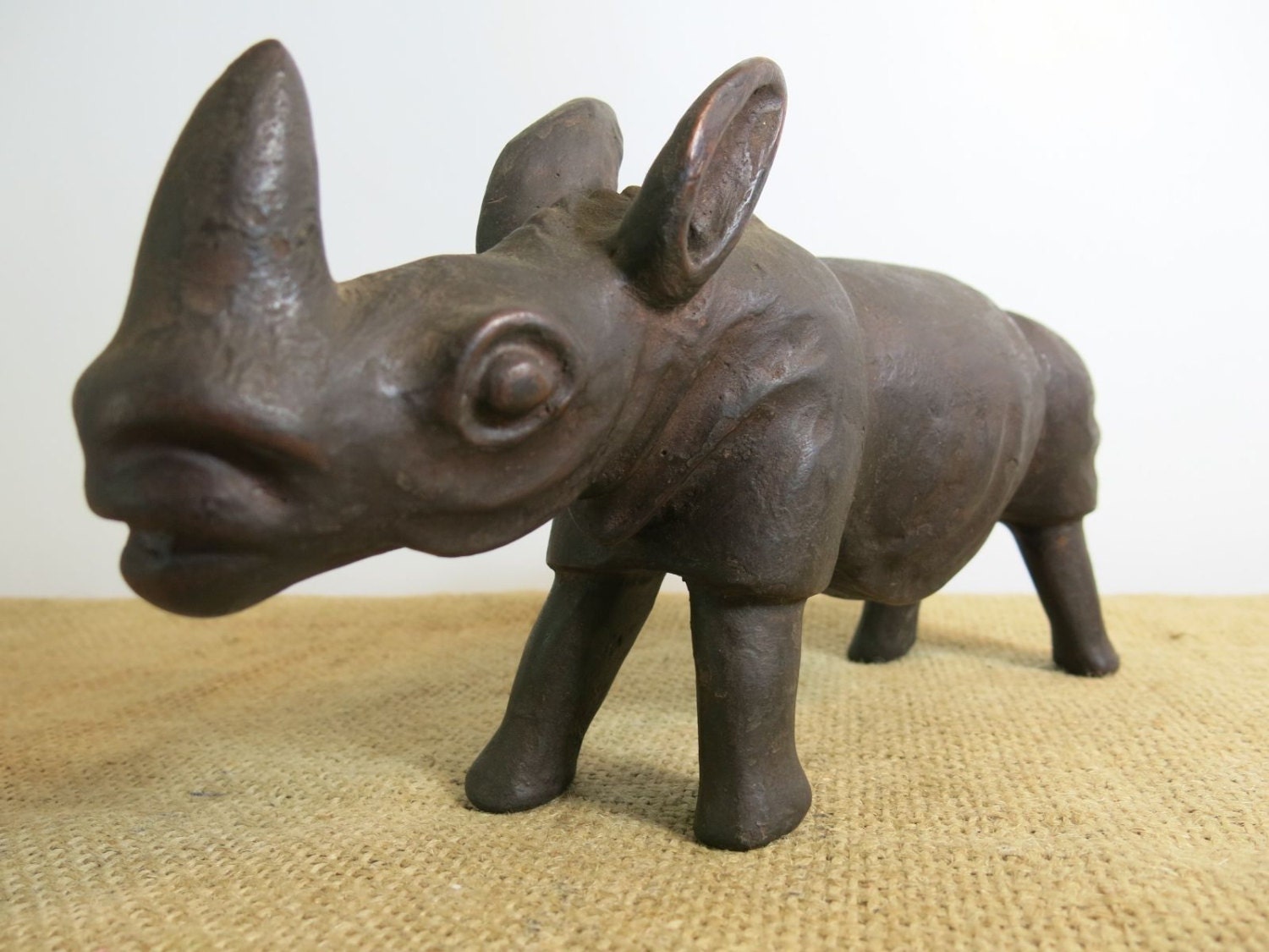 wooden rhino statue