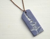 botanical pendant in violet polymer clay with a mint flower impression painted in white ~ pattern