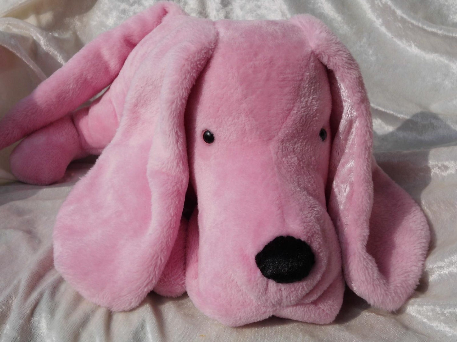 pink plush dog toy