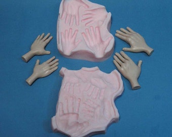 Moldf10 - Hand Mold, size 2-inch to 1.75 inches long. Designed by Maureen Carlson. Fits with our 2" - 3" face molds and Foot Mold F9