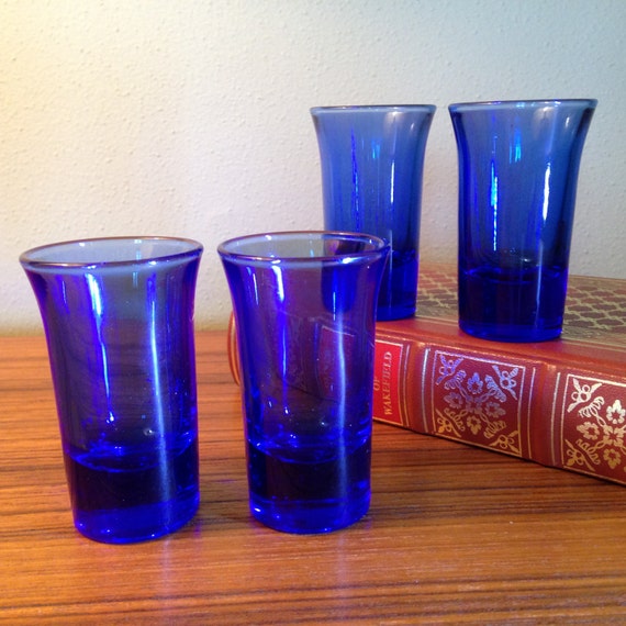 Four vintage cobalt blue shot glasses by FromTheSeller on Etsy