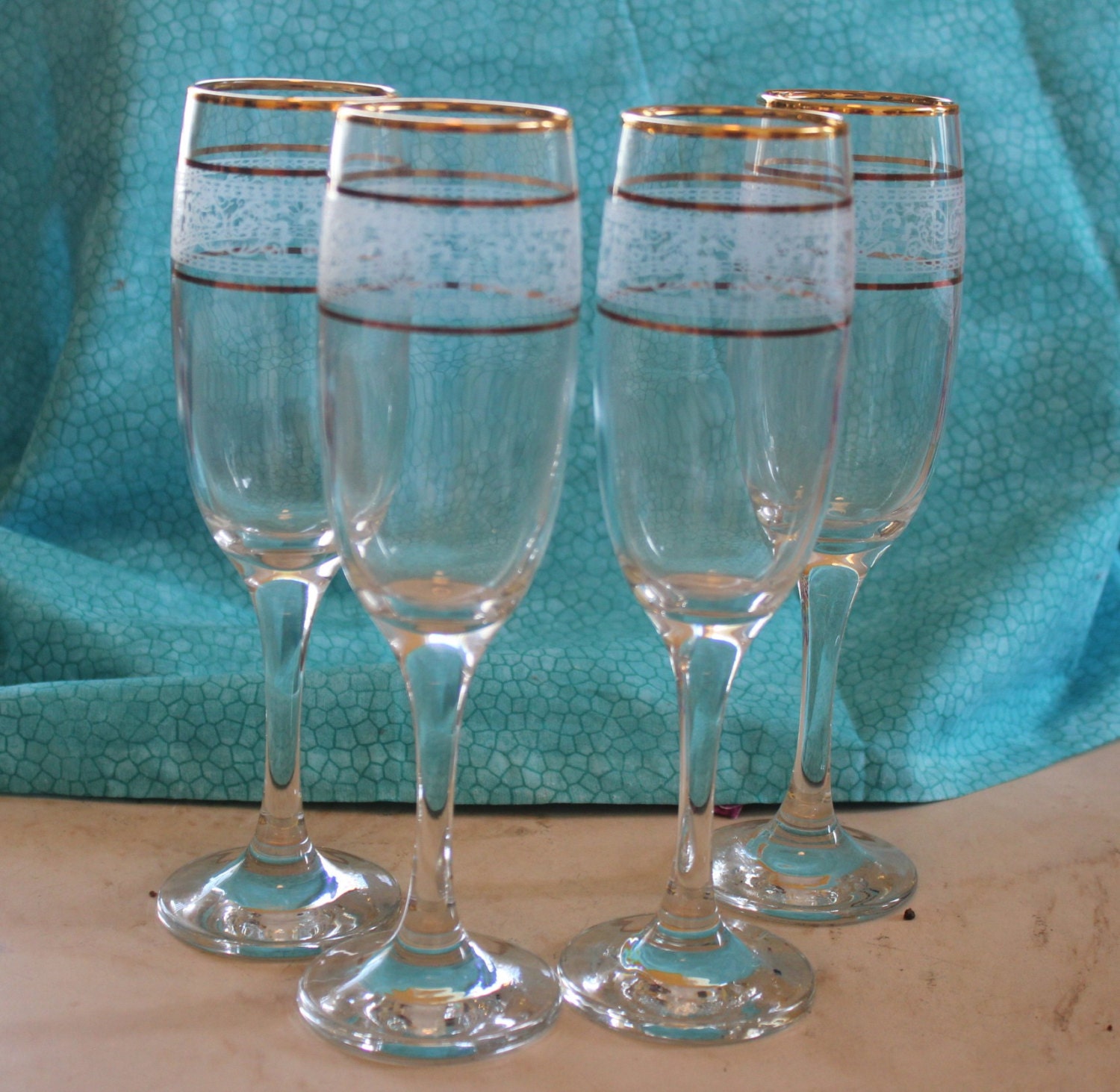 Four Vintage Etched Gold Trim Crystal Champagne Flutes