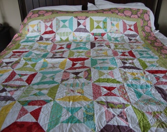 A twin-sized quilt made from Moda Chantilly