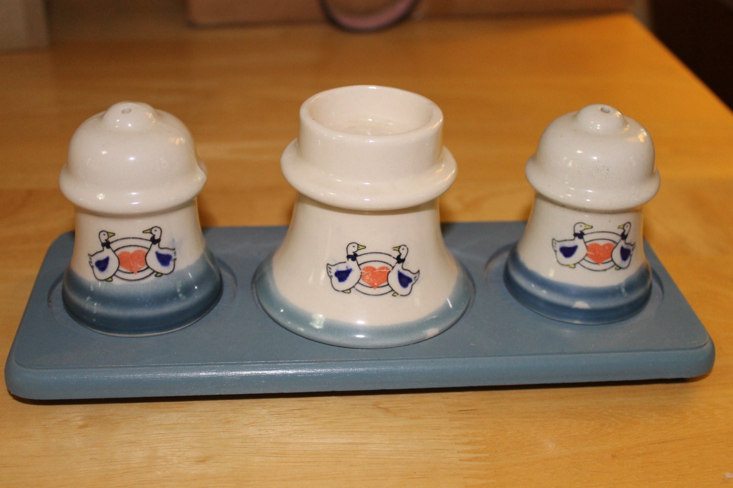 Salt and Pepper Shakers w Candle Holder in Middle