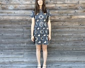 Lion print petal collar dress Supayana