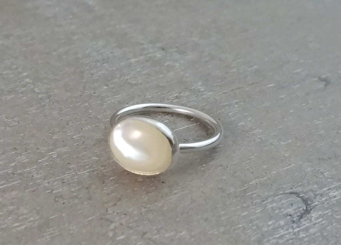 White Mother of Pearl Ring set in Sterling Silver size 8.5