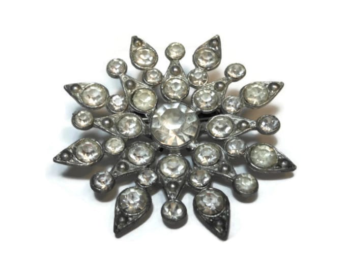1930s rhinestone star burst brooch with faux marcasite in pot metal