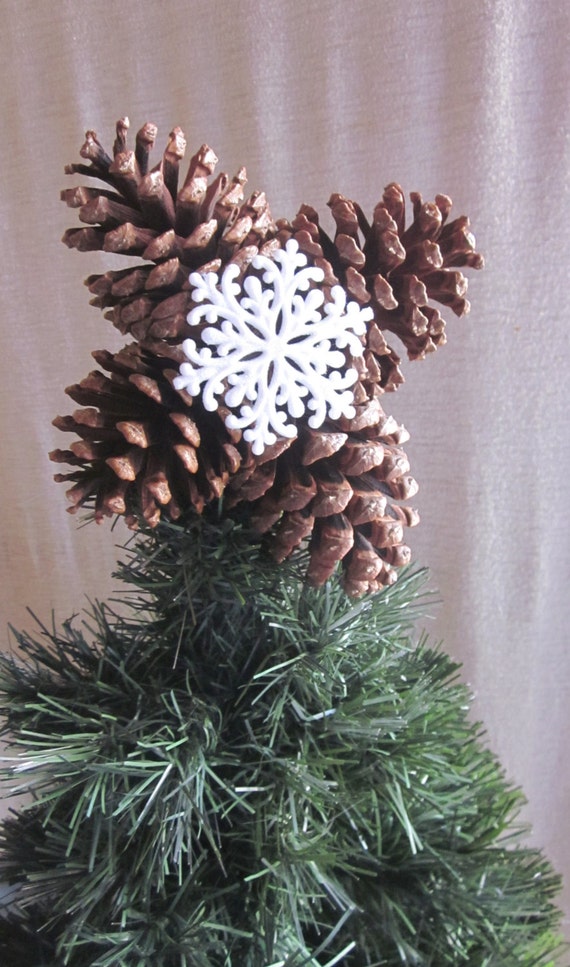 items similar to christmas tree topper from large pine items similar to christmas tree topper from large pine