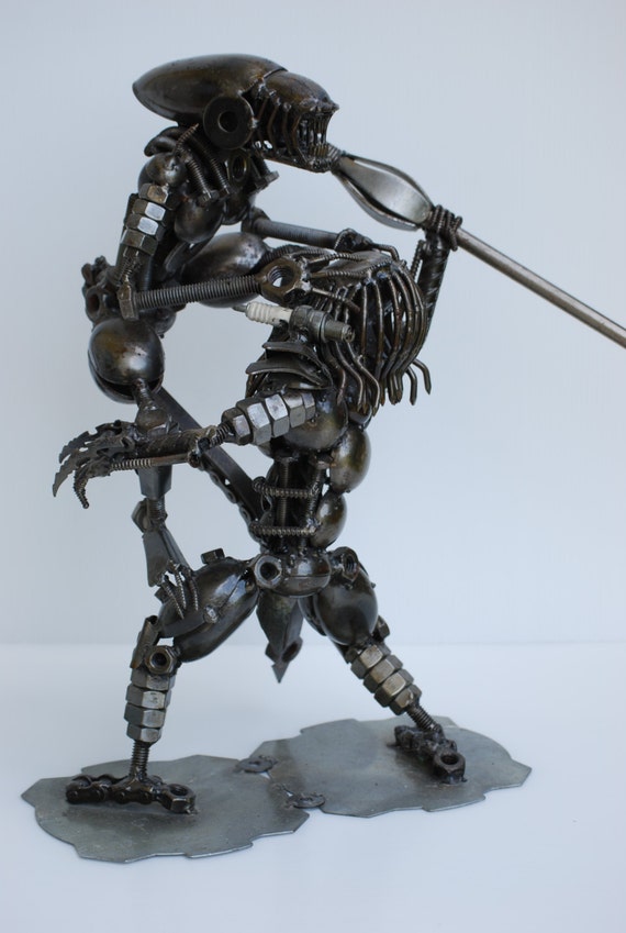 scrap metal alien figure