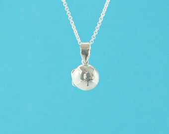 Sterling silver round locket - flattened ball shape - plain smooth round silver keepsake - opens to side with small hinge - .925 stamped