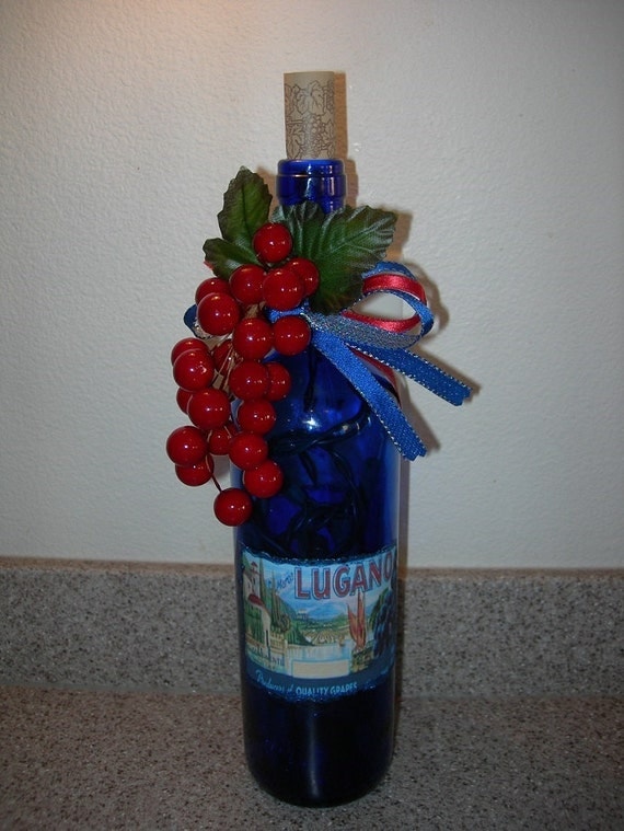 Lighted and Decorated Blue Wine Bottle With by silkwormflorals