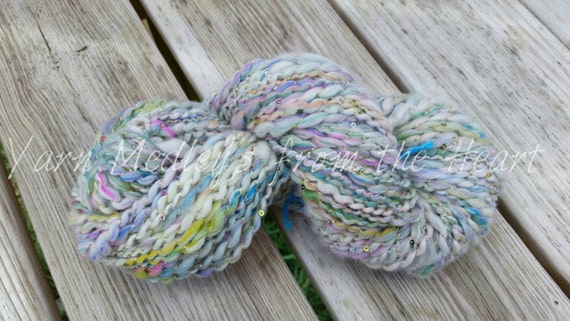 109+ yards handspun merino/alpaca with gold metallic/sequin thread