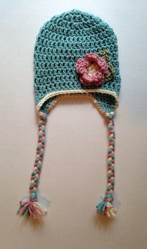 Items similar to Handmade crochet baby hat with. Ear flaps flower hat