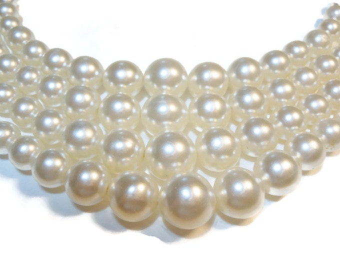 Stunning 4 strand milky white graduated pearl neckace marked Japan