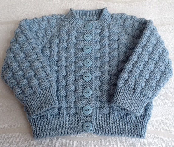 Hand knitted blue baby cardigan. Cashmerino baby by emilyandevelyn