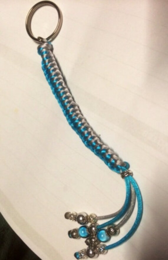 Items similar to Braided string and beaded key chain on Etsy