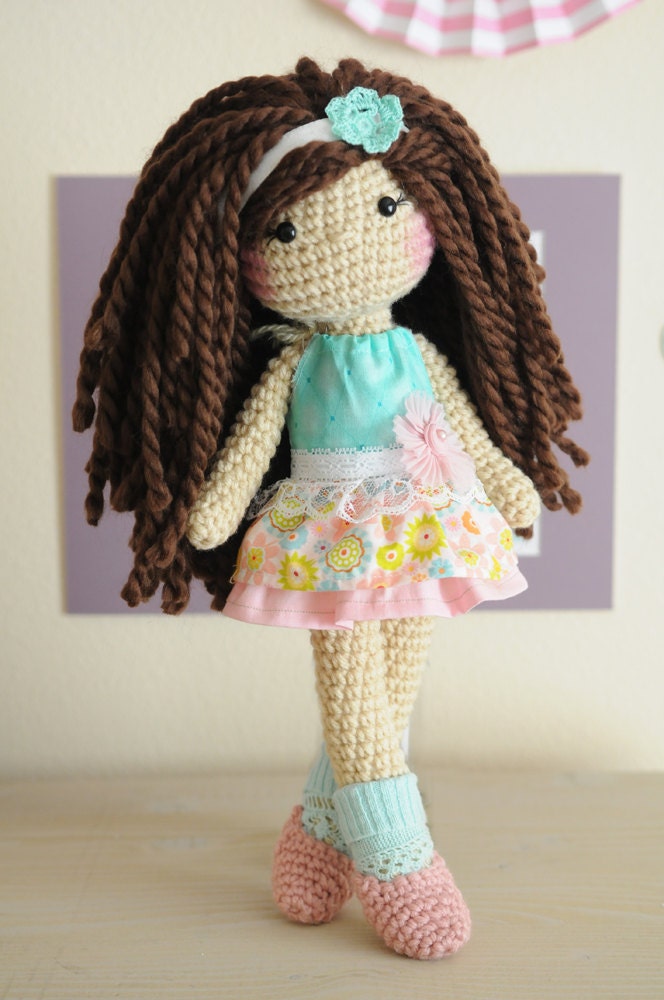 doll with curly brown hair