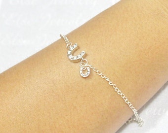 Bracciale cristalli neri con ferro e cavallo in argento