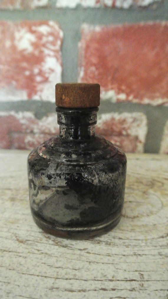 Charming Round Antique Glass Shoe Polish Bottle With