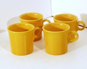 4 Fiesta Yellow cups, all perfect and ready for a new home. 4 Fiesta Yellow cups, all perfect and ready for a new home.