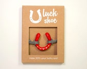 Red â��LuckShoeâ�� bracelet to make 2014 your lucky year - LUCKSHOE