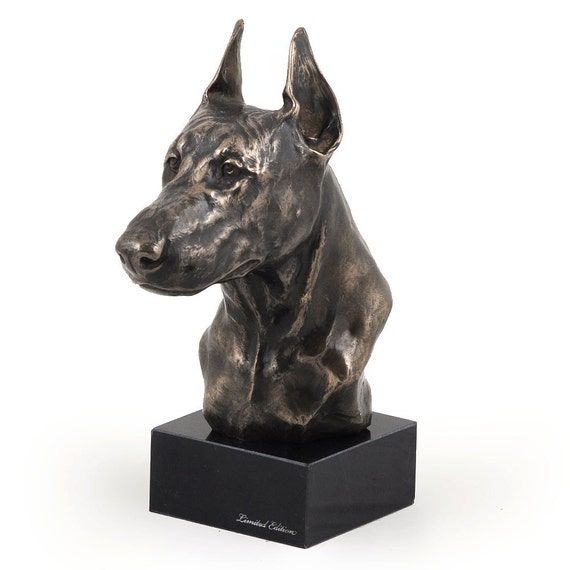 doberman stone statue