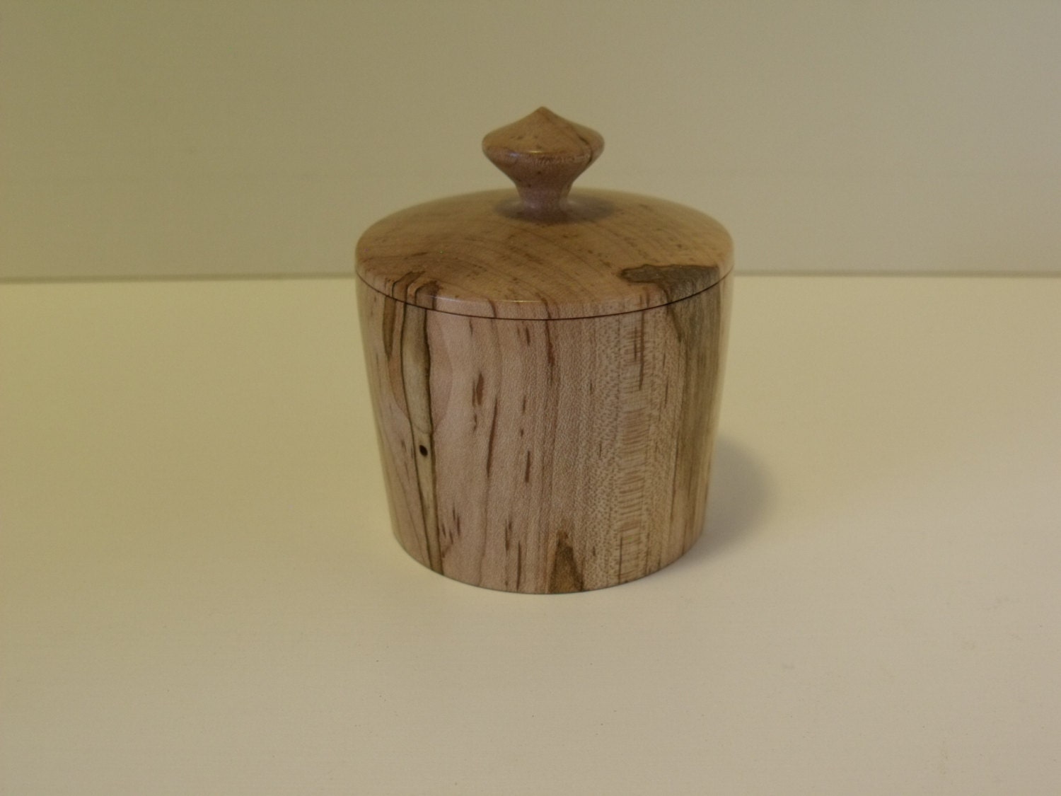 Decorative lathe turned wooden box.