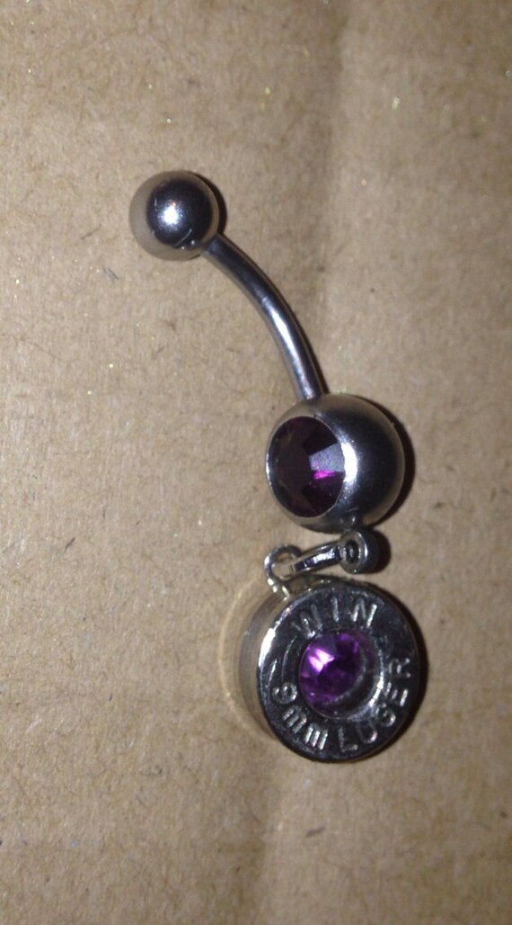 Items similar to Purple 9mm Bullet casing belly button ring nickel on Etsy