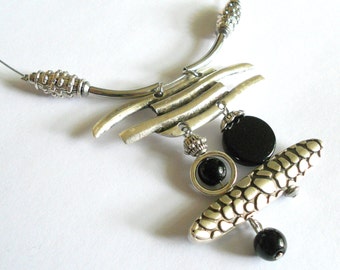 Statement necklace, silver bib necklace, unique necklaces for women, black stone necklace, asymmetric jewelry, metal jewelry, boho jewelry