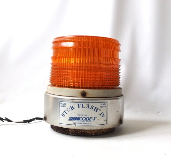 vintage 1970's orange beacon light star flash by RecycleBuyVintage