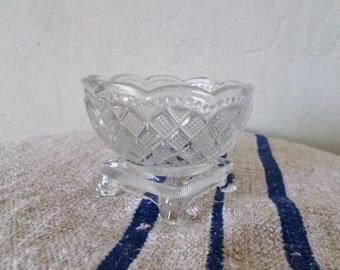 Clear glass jewerly organizer on pedestal foot